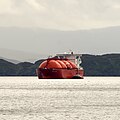 Gas tanker off a liquefaction factory in a fjord in Norway