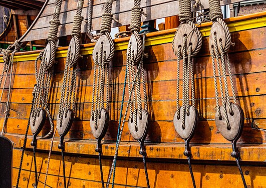 Detail of Expedition ship Willem Barentsz. Knotted rope around ship pulleys.