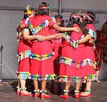 Surinamese indigenous dancers Indian dance of Suriname (cropped).JPG