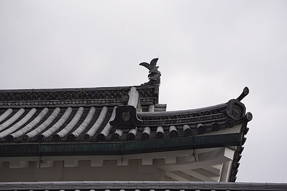 Japanese temple roof under a grey sky