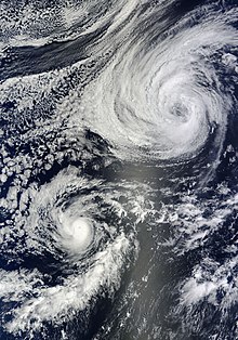 August 22 -- Karina (lower left) as a Category 1 hurricane with Tropical Storm Lowell (upper right) Karina & Lowell Aug 22 2014 1930Z.jpg