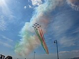 The Frecce Tricolori race on the Molo Audace of Trieste, on the occasion of the last stage of the Giro d'Italia 2014