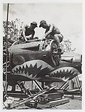 Airfield crew working on Lockheed P-38 fighter plane engines, c. 1944 Lockheed P-38 fighter plane engines slnsw.jpg