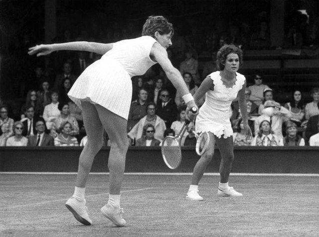 Margaret Court playing doubles at Wimbledon alongside Evonne Goolagong