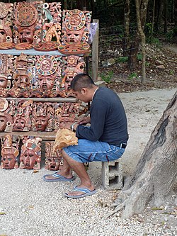 Mask Carving at Chichen Itza (8265011370).jpg