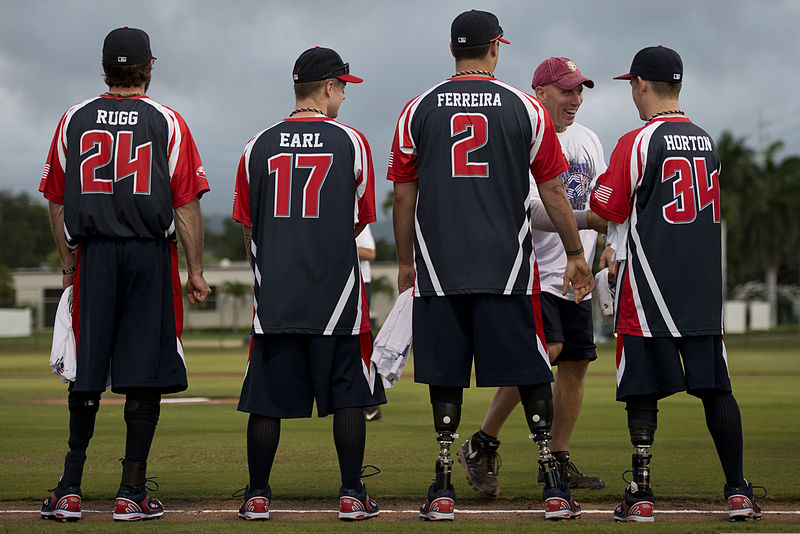 File:Members of the Wounded Warrior Amputee Softball Team (WWAST) greet members with the Hickam Force and Hickam Chiefs teams during player introductions 130108-F-ZB240-730.jpg