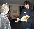 Signing a copy of his children's book, Tales From Wrescal Lane, 2004