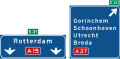 K4: Hoge beslissingswegwijzer langs autosnelweg met rijstrookpaneel voor de doorgaande richting en aftakkingspaneel voor de afgaande richting, met interlokale doelen, routenummers autosnelwegen en Europese hoofdroutes