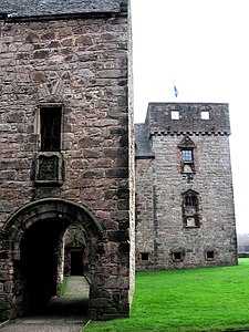 The barrel vaulted gatehouse entrance leads by a path to the main entrance Newark Castle gatehouse.jpg
