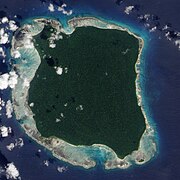 A NASA satellite image of North Sentinel Island, a part of India's Andaman and Nicobar Islands, which is covered by a very dense[a] tropical moist forest.[6]