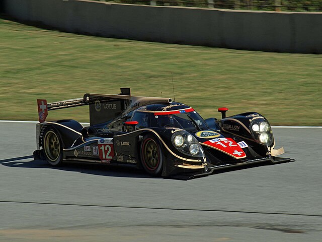 Jani competing in a Lola B12/60 at the 2012 Petit Le Mans