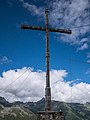 * Nomination Summit cross of Rauher Kopf. Paznaun, Tyrol, Austria --Basotxerri 15:55, 9 August 2017 (UTC) * Promotion A bit too dark I think. And next time you should remove the bottle before taking the photo. Overall good enough for QI, especially since the inscription is readable very well. --Milseburg 09:32, 10 August 2017 (UTC)  Done OK, brighter now. Sorry, the bottle wasn't mine Thanks for the review! --Basotxerri 15:42, 10 August 2017 (UTC)