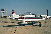 A Swiss-registered PC-7, fitted with additional 240 L (53 imp gal; 63 US gal) fuel drop tanks under each wing, 1987. Pilatus PC-7, Private JP6001892.jpg