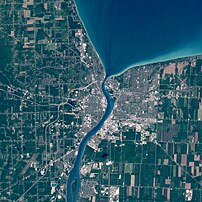 The cities of Sarnia, Ontario (right) and Port Huron, Michigan (left), located at the southern end of Lake Huron.
