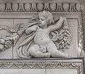 * Nomination Putto at the medium Avant-corps of the Museum of Natural History, Vienna --Hubertl 06:03, 13 May 2016 (UTC) * Promotion Good quality. --Jacek Halicki 08:17, 13 May 2016 (UTC)