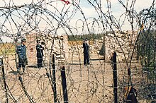 Police in front of remains of peace chapel, ca 1985 RAF Molesworth early 80s 2.jpg