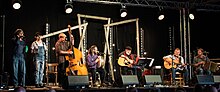 Roy Bailey and guests performing at his last Towersey Festival in 2018. Roy Bailey and band, Towersey 2018.jpg