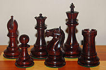 Chess pieces in red sandalwood SandalwoodChessPieces.jpg