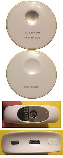 All sides of a Scanadu Scout First Edition. It is approximately 6 cm in circumference and 1.6 cm in height. This device was used in the trial until it become dysfunctional. Scanadu Scout First Edition.jpg