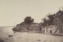 1858 picture of Sati Chaura Ghat on the banks of the River Ganges, where on 27 June 1857 many British men lost their lives and the surviving women and children were taken prisoner by the rebels. Slaughter Ghat, Cawnpore.jpg