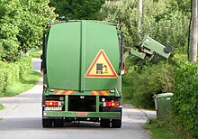 A specialized trash collection truck providing regular municipal trash collection in a neighborhood in Stockholm, Sweden Sophamtning 2010.jpg
