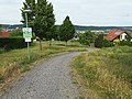 20 June 2021 (according to Exif data) File:Spielplatzweg Grünstreifen Wohngebiet Kirschengarten Tauberbischofsheim.jpg