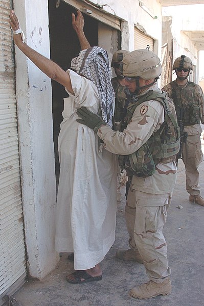 File:Staff Sgt. Jesse Wyant searches an Iraqi man - DVIDS 2004.jpg