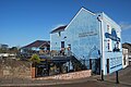 The Gatehouse Pub Monmouth - From the Monnow Bridge. Showing the Riverside Gallery where three houses once stood