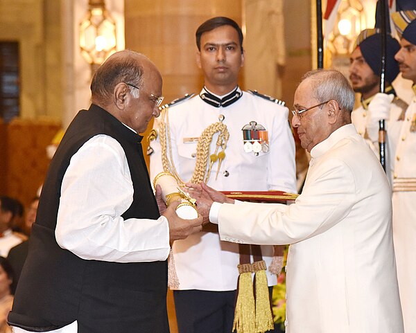 The President, Shri Pranab Mukherjee presenting the Padma Vibhushan Award to Sharad Pawar, at a Civil Investiture Ceremony, at Rashtrapati Bhavan, in 