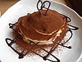 Tiramisu with cocoa powder and chocolate sauce (2398796815).jpg