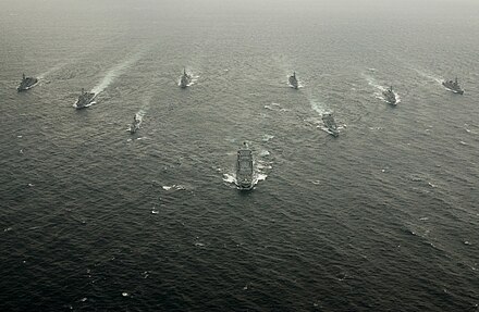 Indian, Japanese and US naval warships take part in a military exercise near Bōsō Peninsula in 2007. India is one of the only three nations with whom Japan has a security pact, the other two being the United States and Australia.[57]