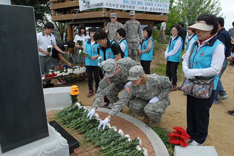 File:U.S. Soldiers lay flowers in front of the Hill 303 monument during a wreath-laying and memorial ceremony at the monument near Camp Carroll in Waegwan, South Korea, June 15, 2012 120615-A-PA262-005.jpg