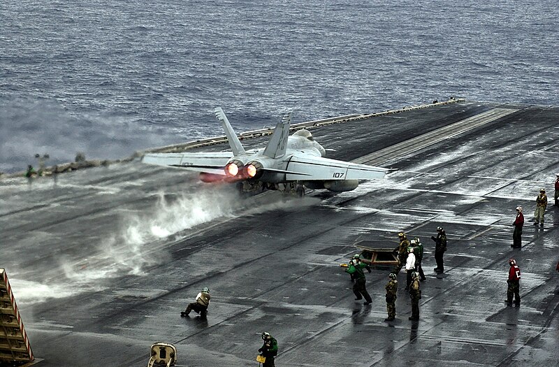 File:US Navy 070305-N-7130B-060 An F-A-18E Super Hornet, assigned to the "Fighting Redcocks" of Strike Fighter Squadron (VFA) 22, rockets down the number two steam powered catapult track.jpg