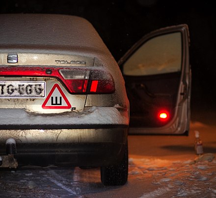 Russian studded tires warning sticker.