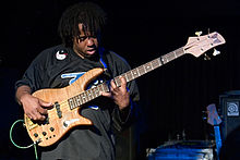 Victor Wooten soloing on the electric bass guitar. Victor Wooten 2.jpg
