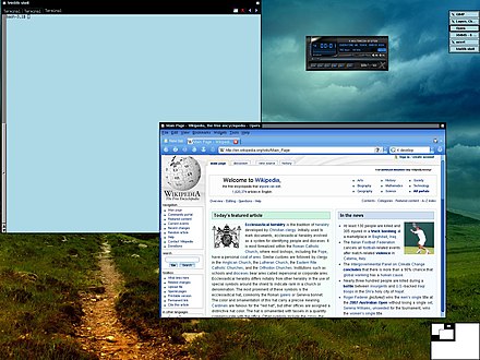 A screen shot of Vtwm in LFS running mrxvt, xmms and the Opera web browser