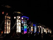 Giant kiriko lanterns lined up at night during the Wajima Taisai