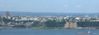 Lincoln Tunnel Helix (left) and Ventilation Towers on the Hudson Palisades Weehawken.HudsonRiver.Palisades.png