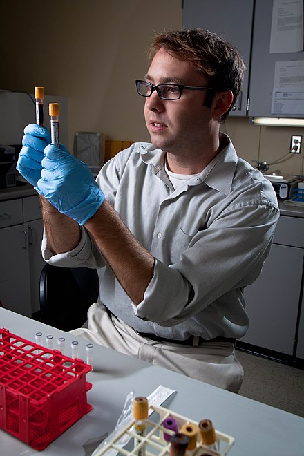 An epidemiologist tests blood samples for pertussis during a 2010 outbreak.