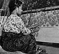 Woman of Flores weaving