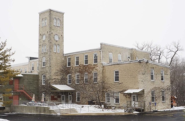 The Cedarburg Woolen Co. Worsted Mill was constructed in 1880 and ceased production in 1980. It currently houses shops, offices, and studios.