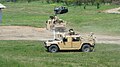 Romanian Humvees and a TABC-79 during the Infantry Day military demonstration.