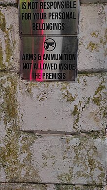 "No Arms & Ammunition" sign found outside a restaurant in Chennai, India "No Arms & Ammunition" sign found outside a restaurant in Chennai, India.jpg