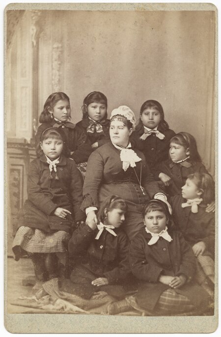 Teacher Mary R. Hyde and students at Carlisle Indian Training School