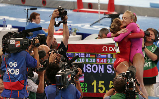 2008 Summer Olympics - Liukin hugs Johnson