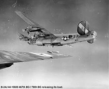 Consolidated B-24J-65-CF Liberator, serial 44-10600, of the 788th Bomb Squadron releasing its bomb load during WWII. Based at RAF Rackheath. 467bg-b241.jpg