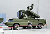 A fighting vehicle (a TELAR) 9AЗЗBMЗ-1 of the 9K33M3 Osa-AKM surface-to-air missile system (Russian: 9К33М3 Оса-АКМ) exhibited at the VDNKh in Moscow. 2015.