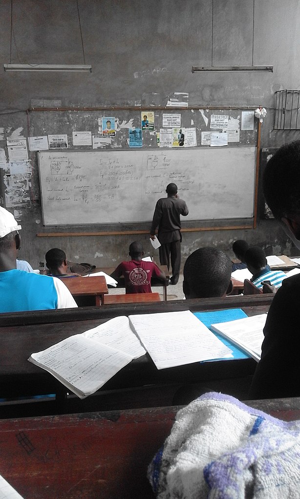 File:A lecturer lecturing in a class at Yaba College of ...