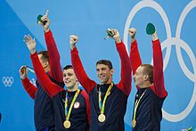 The American final team (Adrian, Held, Phelps, and Dressel), after winning the 4 x 100 m freestyle relay at the 2016 Olympics. Adrian, Held, Phelps, Dressel Rio 2016.jpg