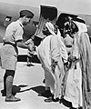 Air Commodore Whitney Straight, Air Officer Commanding RAF Transport Command, Middle East, saying goodbye to the Sheikh Khalifa, cousin of the ruler of Bahrain, and his two sons, 18 January 1945. CM6013.jpg